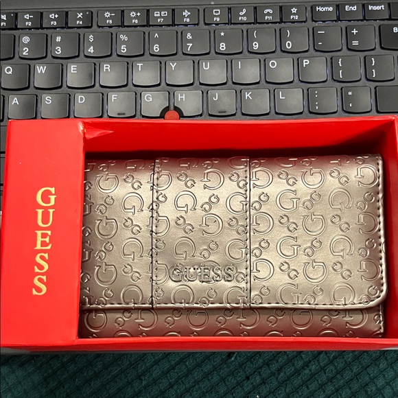 Guess Handbags - Guess Gold Embossed Wallet